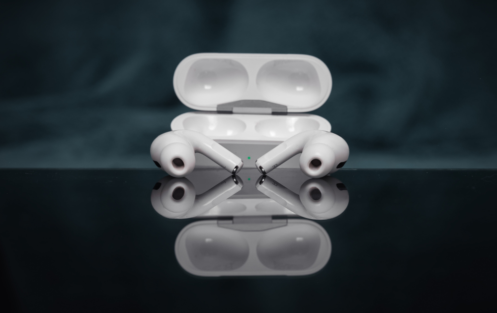 AirPods in front of case