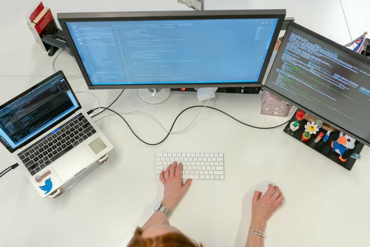 Woman coding on computer