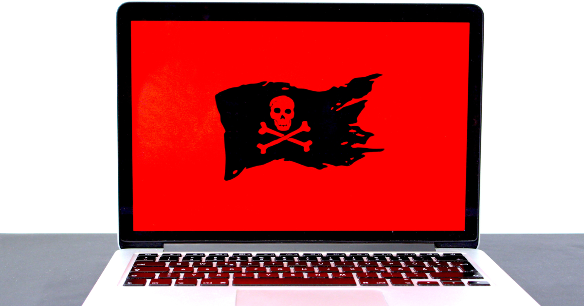 Laptop with black flag on screen