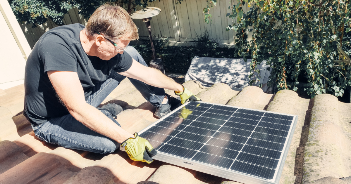 Man installing one solar panel